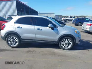 2016 FIAT 500X Lounge z VIN ZFBCFXDT2GP363767, wystawiony jako IAAI lot #37885612 z przebiegiem 74 859 mil mil oraz . Historia ofert i sprzedaży dostępna na DreamBid. Obrazek 13.