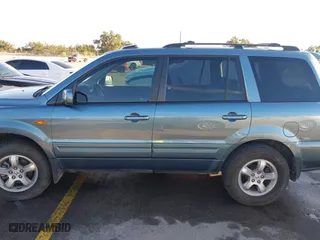 2007 Honda Pilot EX-L with VIN 5FNYF285X7B045780, listed as a IAAI auction lot 41324224 with 168,911 mi miles. Bid and sale history available at carsss.com. Image 14.