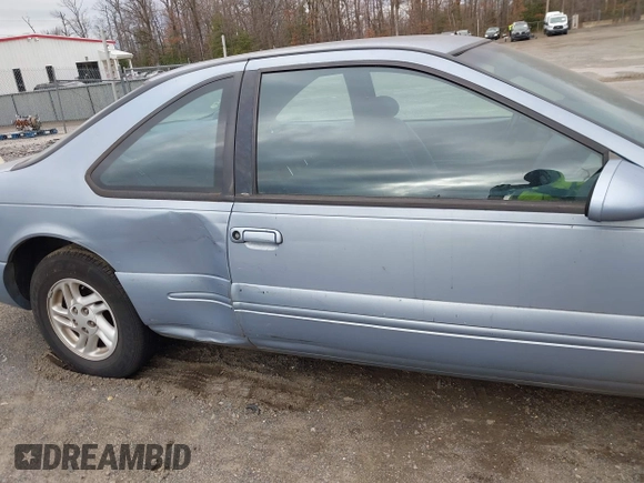 1997 Ford Thunderbird LX z VIN 1FALP62W2VH105702, wystawiony jako IAAI lot #41713980 z przebiegiem 90 775 mil mil oraz . Historia ofert i sprzedaży dostępna na DreamBid. Obrazek 6.