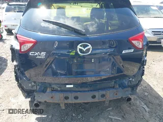 2016 Mazda CX-5 Touring with VIN JM3KE4CY0G0916908, listed as a IAAI auction lot 41848823 with 53,255 mi miles. Bid and sale history available at carsss.com. Image 16.