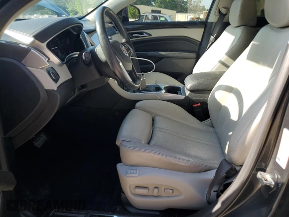 2016 Cadillac SRX Performance Collection z VIN 3GYFNCE30GS572828, wystawiony jako Copart lot #55176485 z przebiegiem 108 767 mil mil oraz Szkoda całkowita • Salvage title. Historia ofert i sprzedaży dostępna na DreamBid. Obrazek 7.