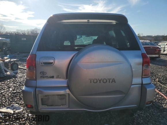 2003 Toyota RAV4 with VIN JTEGH20V130092184, listed as a Copart auction lot 42252955 with 282,299 mi miles and Salvage Title. Bid and sale history available at DreamBid. Image 6.