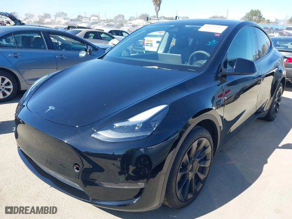 2023 Tesla Model Y Long Range with VIN 7SAYGDEE5PF972024, listed as a IAAI auction lot 41623512 with 22,202 mi miles. Bid and sale history available at carsss.com. Image 18.