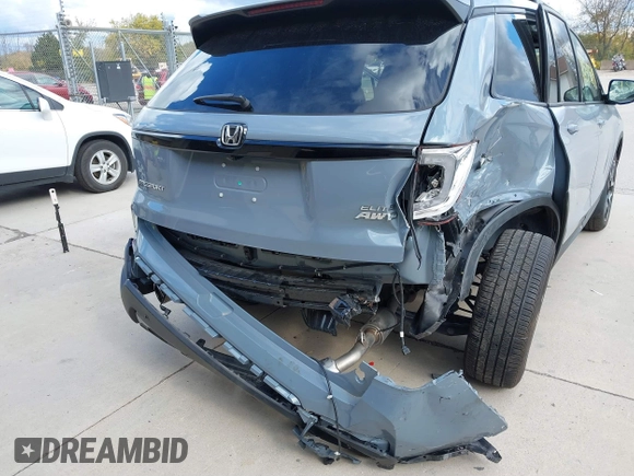 2023 Honda Passport Elite with VIN 5FNYF8H03PB000039, listed as a IAAI auction lot 40593339 with 33,697 mi miles and . Bid and sale history available at DreamBid. Image 6.