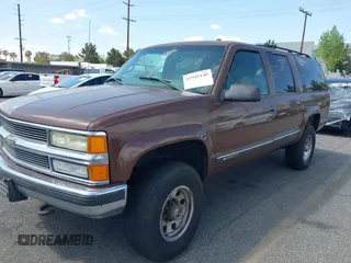 1999 Chevrolet Suburban with VIN 1GNGK26J9XJ494147, listed as a IAAI auction lot 41945149 with 102,652 mi miles. Bid and sale history available at carsss.com. Image 2.