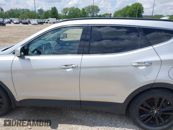 2013 Hyundai Santa Fe Sport z VIN 5XYZUDLA8DG055576, wystawiony jako IAAI lot #42392636 z przebiegiem 165 096 mil mil oraz . Historia ofert i sprzedaży dostępna na DreamBid. Obrazek 14.