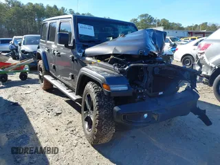 2019 Jeep Wrangler Unlimited Sahara with VIN 1C4HJXEG3KW641979, listed as a IAAI auction lot 41311449 with 58,602 mi miles and . Bid and sale history available at DreamBid. Image 1.