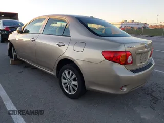 2009 Toyota Corolla with VIN 1NXBU40E59Z164488, listed as a IAAI auction lot 40907058 with 180,161 mi miles. Bid and sale history available at carsss.com. Image 3.
