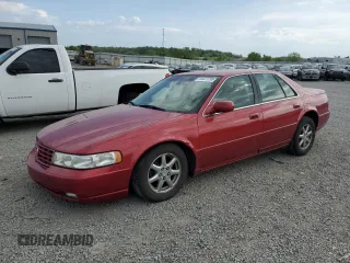 2004 Cadillac Seville Luxury SLS z VIN 1G6KS54YX4U100916, wystawiony jako Copart lot #54471295 z przebiegiem 59 059 mil mil oraz Szkody całkowita. Historia ofert i sprzedaży dostępna na DreamBid. Obrazek 1.