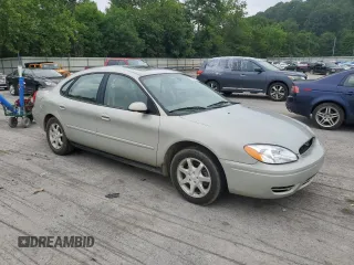 2006 Ford Taurus SEL with VIN 1FAFP56U86A194072, listed as a Copart auction lot 63779615 with 77,377 mi miles and Salvage title. Bid and sale history available at DreamBid. Image 4.