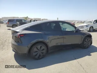 2024 Tesla Model Y z VIN 7SAYGDED7RF050963, wystawiony jako Copart lot #60683895 z przebiegiem 23 100 mil mil oraz Czysty tytuł • Clean title. Historia ofert i sprzedaży dostępna na DreamBid. Obrazek 3.