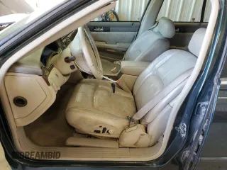 1999 Cadillac Seville Luxury SLS z VIN 1G6KS54Y5XU920020, wystawiony jako Copart lot #53956115 z przebiegiem 104 096 mil mil oraz Tytuł czysty. Historia ofert i sprzedaży dostępna na DreamBid. Obrazek 7.