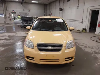2010 Chevrolet Aveo 1LT z VIN KL1TD5DE2AB101431, wystawiony jako IAAI lot #41138812 z przebiegiem 131 346 mil mil oraz . Historia ofert i sprzedaży dostępna na DreamBid. Obrazek 13.