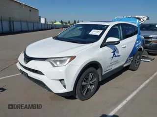 2018 Toyota RAV4 XLE with VIN 2T3WFREV7JW480326, listed as a IAAI auction lot 42021965 with 174,347 mi miles. Bid and sale history available at carsss.com. Image 23.