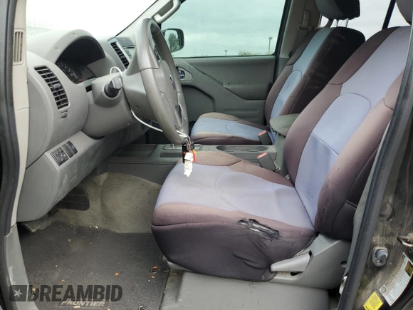 2015 Nissan Frontier SV z VIN 1N6AD0FRXFN722101, wystawiony jako Copart lot #76144314 z przebiegiem 87 902 mil mil oraz Szkoda całkowita • Salvage title. Historia ofert i sprzedaży dostępna na DreamBid. Obrazek 7.