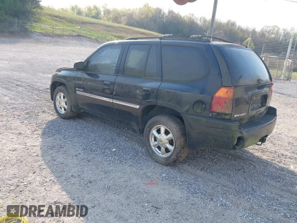 2006 GMC Envoy SLE with VIN 1GKDT13S262204960, listed as a IAAI auction lot 42045236 with 183,338 mi miles. Bid and sale history available at carsss.com. Image 3.