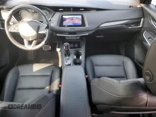2020 Cadillac XT4 AWD Sport z VIN 1GYFZFR47LF140227, wystawiony jako Copart lot #63984125 z przebiegiem 36 080 mil mil oraz Czysty tytuł • Clean title. Historia ofert i sprzedaży dostępna na DreamBid. Obrazek 8.
