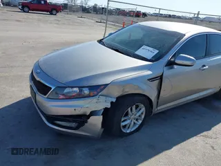 2013 Kia Optima LX with VIN KNAGM4A73D5356339, listed as a IAAI auction lot 41979364 with 140,000 mi miles. Bid and sale history available at carsss.com. Image 6.