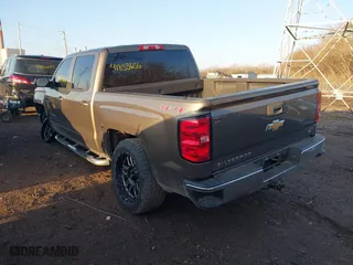 2015 Chevrolet Silverado 1500 LT with VIN 3GCUKREC8FG201619, listed as a IAAI auction lot 41853656 with 147,554 mi miles. Bid and sale history available at carsss.com. Image 3.