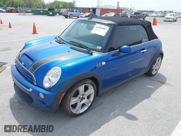 2006 MINI Convertible S with VIN WMWRH335X6TK59110, listed as a IAAI auction lot 42089085 with 101,303 mi miles and . Bid and sale history available at DreamBid. Image 2.