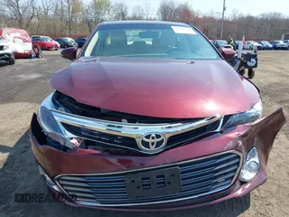 2014 Toyota Avalon Limited with VIN 4T1BK1EB1EU134577, listed as a IAAI auction lot 41994918 with 74,570 mi miles. Bid and sale history available at carsss.com. Image 17.