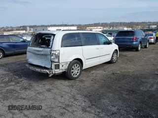2016 Chrysler Town & Country Touring with VIN 2C4RC1BG8GR205497, listed as a IAAI auction lot 41774882 with 105,159 mi miles. Bid and sale history available at carsss.com. Image 4.