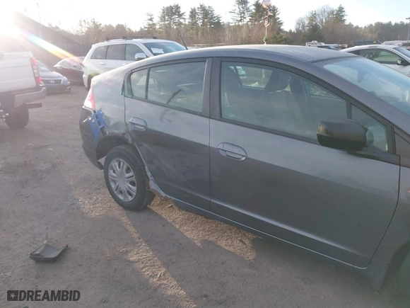 2010 Honda Insight LX with VIN JHMZE2H52AS014667, listed as a IAAI auction lot 41258620 with 138,419 mi miles. Bid and sale history available at carsss.com. Image 6.