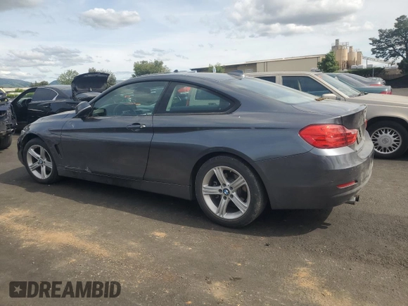 2015 BMW 4 Series 428i with VIN WBA3N3C57FK234685, listed as a Copart auction lot 52236575 with 115,093 mi miles and Salvage title. Bid and sale history available at DreamBid. Image 2.