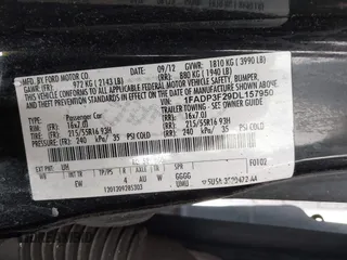 2013 Ford Focus SE with VIN 1FADP3F29DL157950, listed as a IAAI auction lot 41617844 with 128,890 mi miles. Bid and sale history available at carsss.com. Image 9.