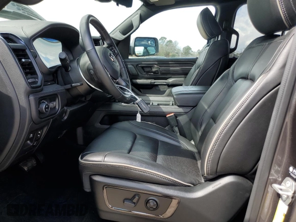 2023 Ram 1500 Limited with VIN 1C6SRFHT2PN598127, listed as a Copart auction lot 49065505 with 31,761 mi miles and Salvage title. Bid and sale history available at DreamBid. Image 7.