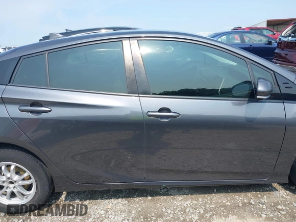 2016 Toyota Prius Four z VIN JTDKARFU1G3027589, wystawiony jako IAAI lot #42391692 z przebiegiem 172 255 mil mil oraz . Historia ofert i sprzedaży dostępna na DreamBid. Obrazek 13.