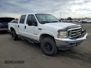2002 Ford Super Duty F-250 XL with VIN 1FTNW21FX2EB12653, listed as a Copart auction lot 68732594 with 282,115 mi miles and Salvage Title. Bid and sale history available at carsss.com. Image 4.