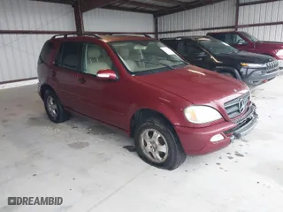 2003 Mercedes-Benz M-Class 3.7L with VIN 4JGAB57E13A448528, listed as a IAAI auction lot 41953003 with 256,637 mi miles. Bid and sale history available at carsss.com. Image 1.