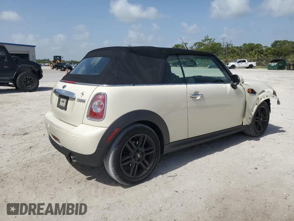 2014 MINI Convertible с VIN WMWZN3C56ET569651, выставлен на аукционе Copart как лот 66455675 с пробегом 117 994 миль миль и Списание • Salvage title. История ставок и продаж доступна на DreamBid. Изображение 3.