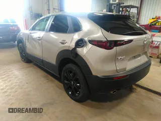 2024 Mazda CX-30 2.5 S Select Sport with VIN 3MVDMBBM0RM658069, listed as a IAAI auction lot 42130803 with 26,714 mi miles. Bid and sale history available at carsss.com. Image 3.