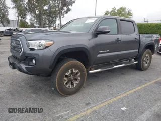 2018 Toyota Tacoma SR5 with VIN 3TMAZ5CN1JM071396, listed as a IAAI auction lot 42061640 with 122,148 mi miles and . Bid and sale history available at DreamBid. Image 17.