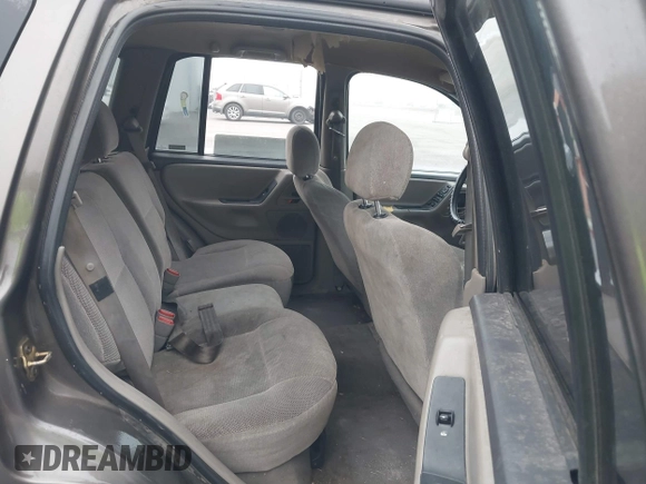 1999 Jeep Grand Cherokee Laredo с VIN 1J4G258S2XC768349, выставлен на аукционе IAAI как лот 41305102 с пробегом 136 848 миль миль и . История ставок и продаж доступна на DreamBid. Изображение 8.