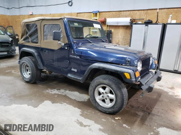 2000 Jeep Wrangler SE with VIN 1J4FA29P1YP739555, listed as a Copart auction lot 58501025 with 128,458 mi miles and Clean title. Bid and sale history available at DreamBid. Image 4.