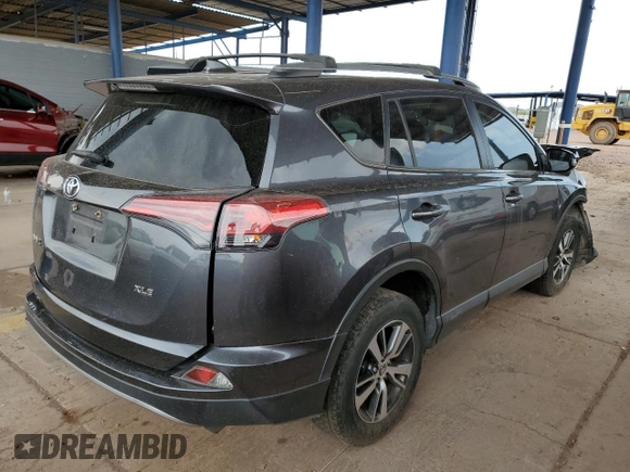 2018 Toyota RAV4 XLE with VIN JTMWFREV9JD131259, listed as a Copart auction lot 64748645 with 93,116 mi miles and Salvage title. Bid and sale history available at DreamBid. Image 3.