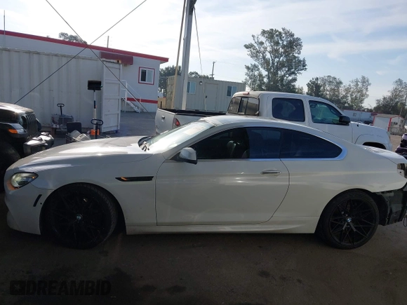 2012 BMW 6 Series 650i with VIN WBALX3C52CC528401, listed as a IAAI auction lot 42046910 with 105,844 mi miles. Bid and sale history available at carsss.com. Image 15.
