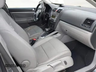 2009 Volkswagen Jetta Sedan SE with VIN 3VWRZ71K49M084983, listed as a IAAI auction lot 42095707 with 154,691 mi miles. Bid and sale history available at carsss.com. Image 5.