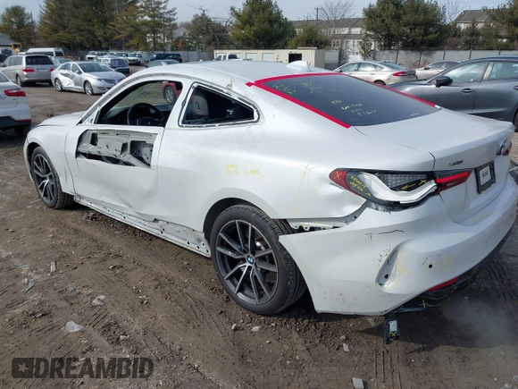 2022 BMW 4 Series 430i xDrive with VIN WBA73AP09NCJ28175, listed as a IAAI auction lot 41486064 with 27,312 mi miles and . Bid and sale history available at DreamBid. Image 3.