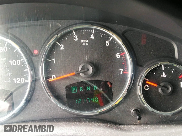 2010 Jeep Liberty Sport with VIN 1J4PN2GK3AW109144, listed as a IAAI auction lot 42135585 with 121,740 mi miles. Bid and sale history available at carsss.com. Image 7.