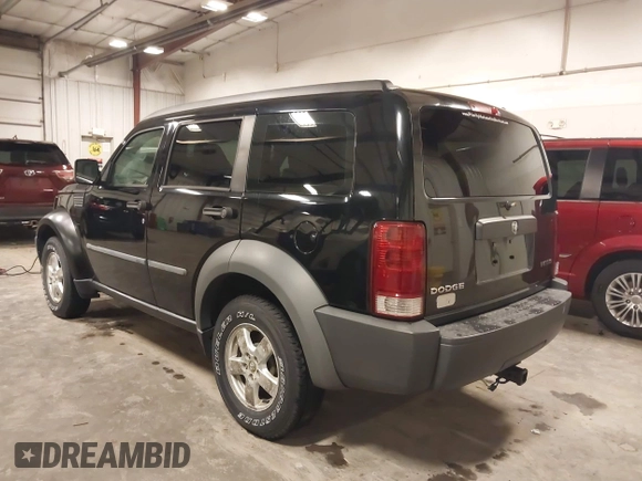 2007 Dodge Nitro SXT with VIN 1D8GU28K97W682907, listed as a IAAI auction lot 42022690 with 158,225 mi miles and . Bid and sale history available at DreamBid. Image 3.