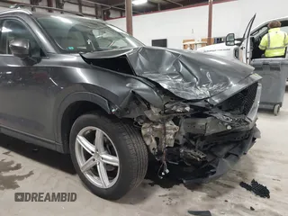 2020 Mazda CX-5 Grand Touring with VIN JM3KFBDM3L0739763, listed as a IAAI auction lot 41751250 with 88,063 mi miles and . Bid and sale history available at carsss.com. Image 6.