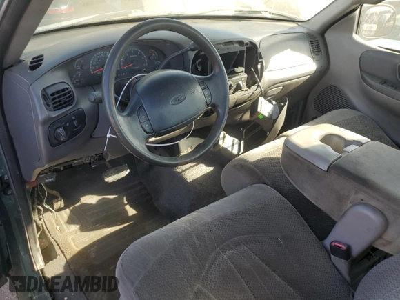 1999 Ford F-150 XL with VIN 2FTZF0720XCA14612, listed as a Copart auction lot 75092304 with 230,897 mi miles and Salvage Title. Bid and sale history available at carsss.com. Image 8.