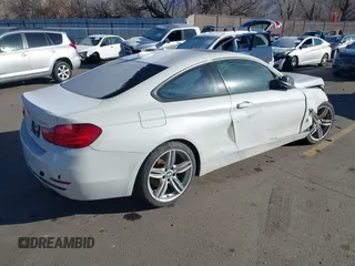 2014 BMW 4 Series 435i with VIN WBA3R1C56EK191996, listed as a IAAI auction lot 41450981 with 125,352 mi miles and . Bid and sale history available at carsss.com. Image 4.
