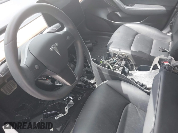 2020 Tesla Model 3 Standard Range Plus with VIN 5YJ3E1EA2LF740225, listed as a IAAI auction lot 41781554 with 46,703 mi miles. Bid and sale history available at carsss.com. Image 18.