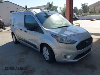 2021 Ford Transit Connect XLT with VIN NM0LS7F26M1502372, listed as a IAAI auction lot 42317867 with 105,069 mi miles and . Bid and sale history available at DreamBid. Image 1.