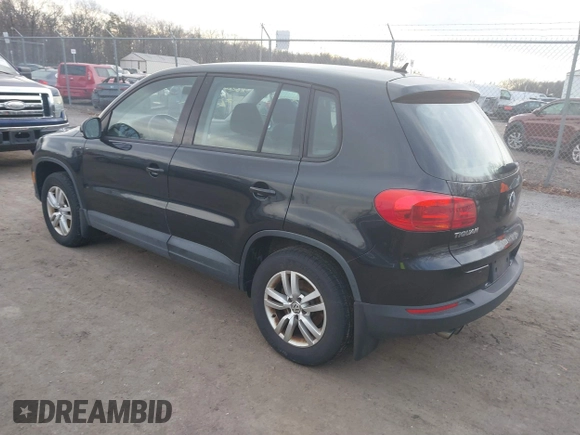 2013 Volkswagen Tiguan S with VIN WVGAV3AX4DW572884, listed as a IAAI auction lot 41626981 with 243,188 mi miles and . Bid and sale history available at DreamBid. Image 3.